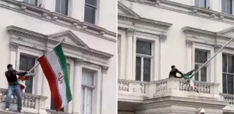 Londra'daki İran Büyükelçiliği'ne tırmanan protestocu devrim öncesi İran bayrağını astı