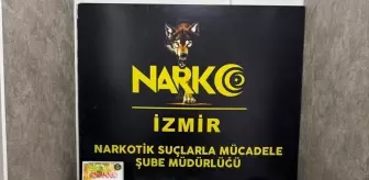 İzmir'de otomobilde 65 kilo 367 gram uyuşturucu ele geçirildi