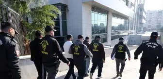 Mersin'de dolandırıcılık yaptıkları iddiasıyla yakalanan 15 zanlıdan 10'u tutuklandı