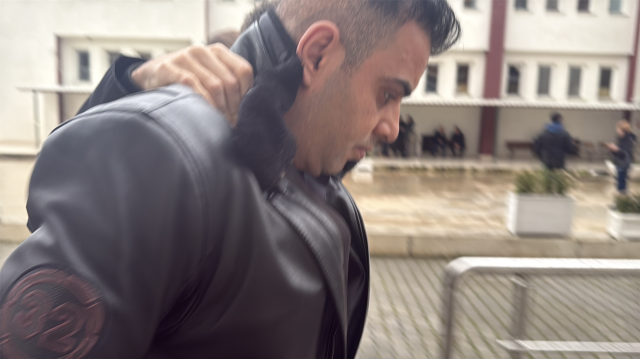 تم طرح هذه الصورة على صديق توغيان، كرفان إمين أوغلو، الذي تم القبض عليه