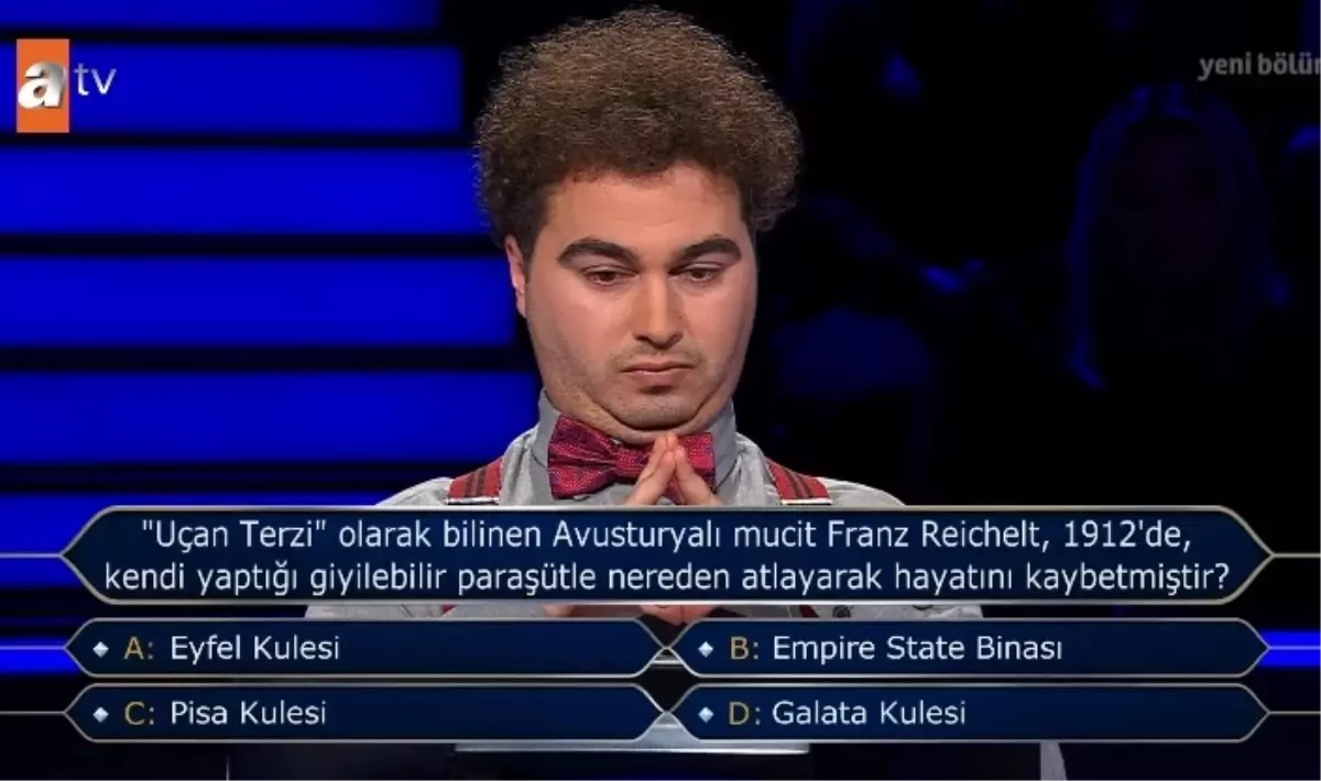 Uçan Terzi' olarak bilinen Avusturyalı mucit Franz Reichelt, 1912'de kendi yaptığı giyilebilir paraşütle n...