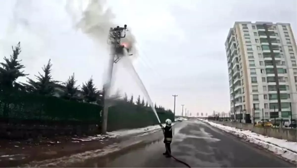 Elektrik direğindeki yangına müdahale, itfaiye erinin gözünden kayda alındı