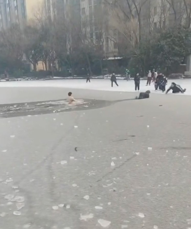 The hero man saved the child who fell into the frozen lake