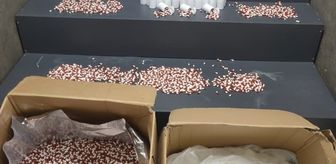 İzmir'de bir evde 104 bin 40 sentetik ecza ele geçirildi
