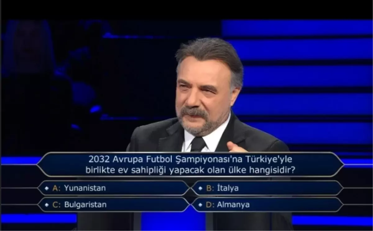 2032 Avrupa Futbol Şampiyonası'na Türkiye'yle birlikte ev sahipliği yapacak olan ülke hangisidir?