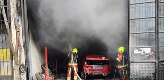 Balıkesir'de oto kaporta dükkanında çıkan yangında 2 araç yandı