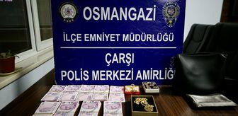 Bursa'da unutulan altın ve para dolu çanta sahibine teslim edildi