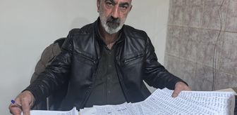 Diyarbakır'da muhtar hayırseverlerden gelen yardımları ihtiyaç sahiplerine ulaştırıyor