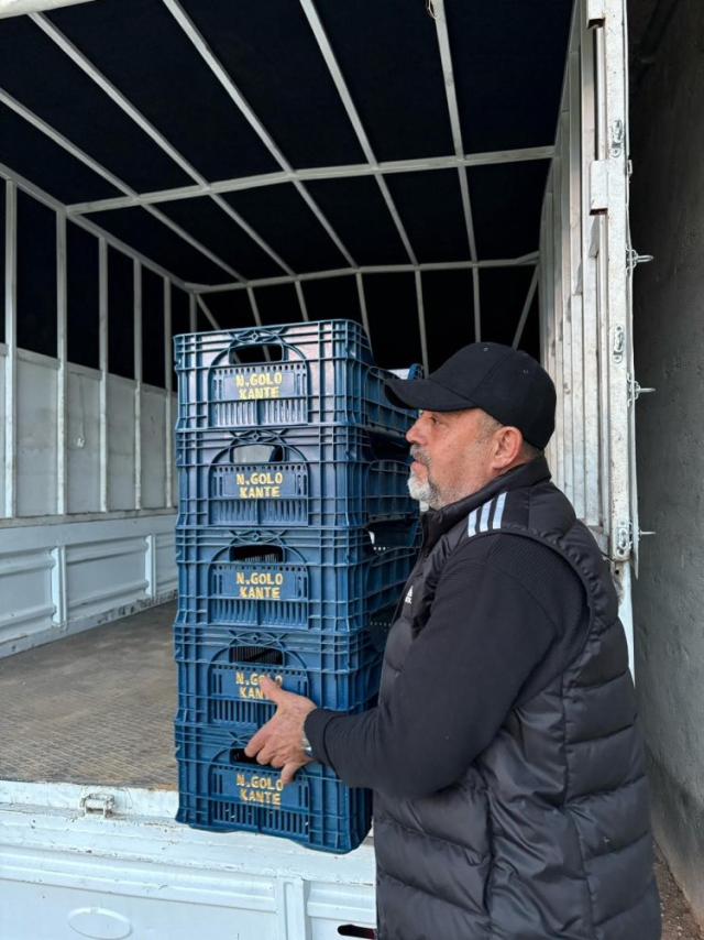 He even had his name written on the crate he collects tomatoes in