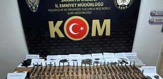 Sakarya'da otomobilde 1460 silah parçası ele geçirildi