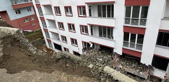 Trabzon'da istinat duvarının çökmesi sonucu bir bina zarar gördü
