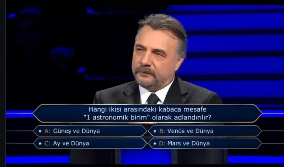 Hangi ikisi arasındaki kabaca mesafe "1 astronomik birim" olarak adlandırılır?