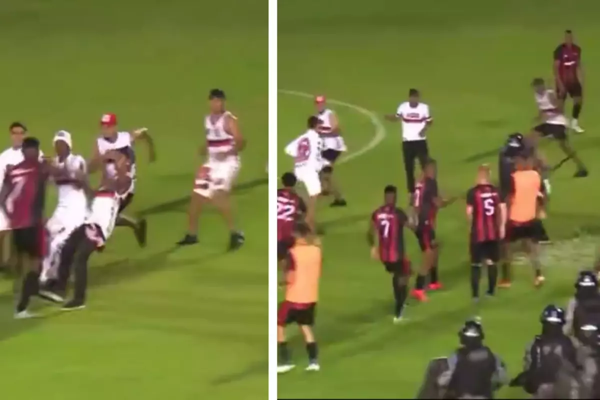 Taraftarlar sahaya girip futbolcularla yumruk yumruğa kavga etti