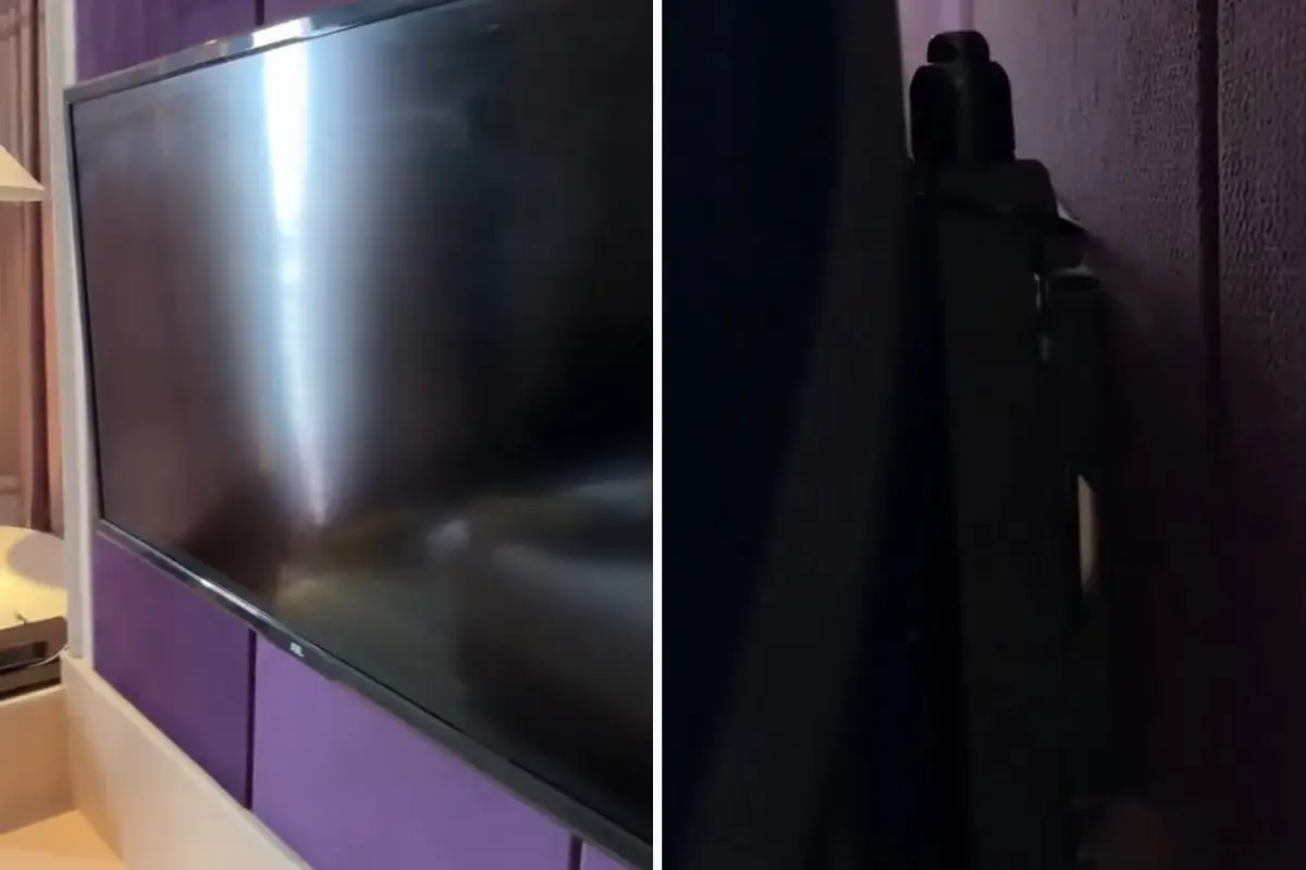 Otel odasında, televizyonun arkasına bakan adam, hayatının şokunu yaşadı