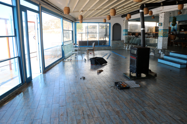 Giant waves swallowed the big restaurant like this