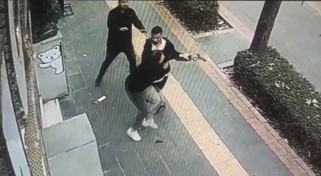 He pointed a gun at his ex-wife's head in the middle of the street and pulled the trigger