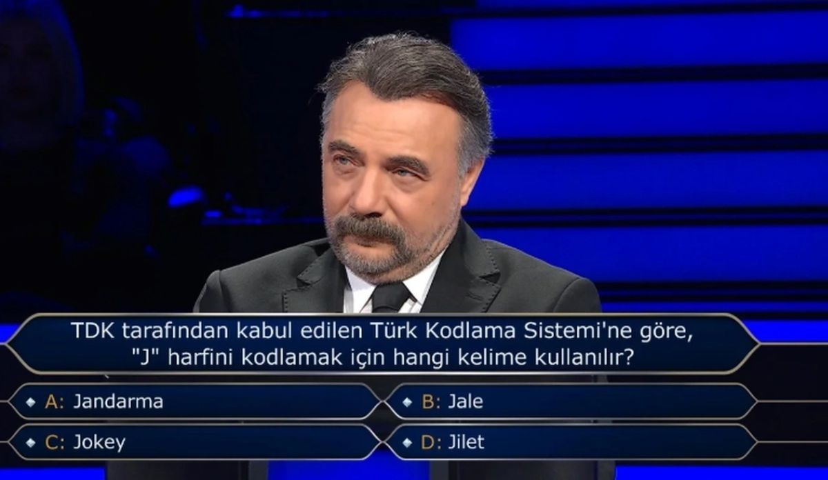 TDK tarafından kabul edilen Türk Kodlama Sistemi'ne gör J harfini kodlamak için hangi kelime kullanılır?