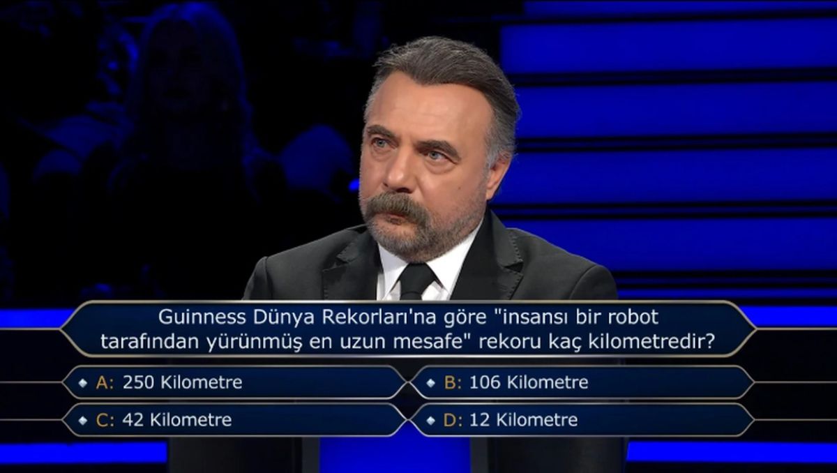 Guiness Dünya Rekorları’na göre insansı bir robot tarafından yürümüş en uzun mesafe rekoru kaç kilometredir?