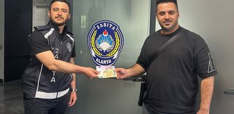 Alanya'da yolda bulunan 700 avro sahibine teslim edildi