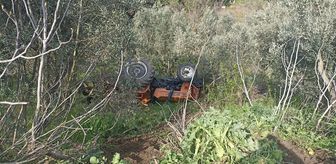 Balıkesir'de devrilen traktördeki 2 kişi yaralandı