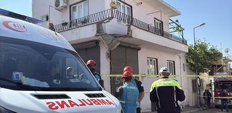 Efeler'de çöken balkondan düşen baba ve oğlu yaralandı
