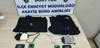 Hatay'da ehliyet sınavına kopya düzeneğiyle girmeye çalışan 2 kardeş yakalandı
