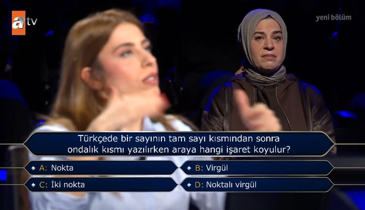 Türkçede bir sayının tam sayı kısmından sonra ondalık kısmı yazılırken araya hangi işaret koyulur?