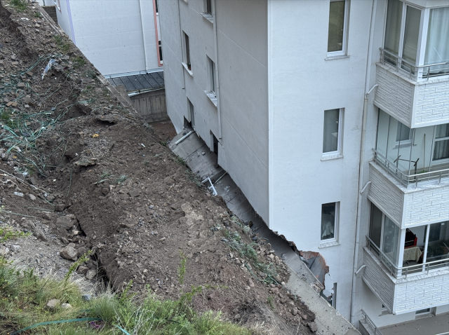 Emergency teams at the site of the collapse