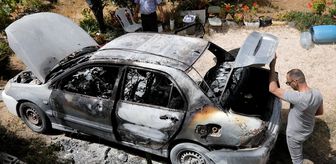 Filistin topraklarını gasbeden İsrailliler, Batı Şeria'da çiftçiye ait bir araç ile traktörü kundakladı