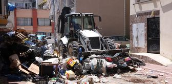 Mersin'de atık biriktirilen ev belediye ekiplerince temizlendi