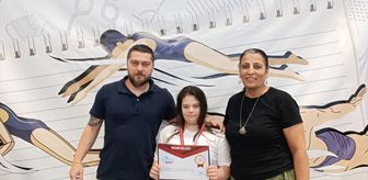 Lösemiyi yenen down sendromlu yüzücü Masal, 'Okul Sporları' müsabakalarında birinci oldu
