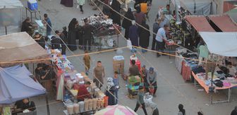 Gazzeliler enkaz arasında kurulan pazarda, kısıtlı imkanlarla bayram alışverişini yapıyor