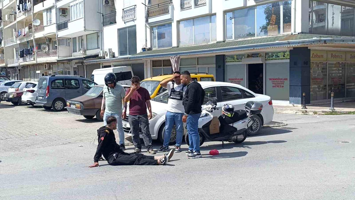 Bisikletli çocuğa çarpmamak için motosikletini devirip yaralandı