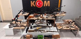 Uşak'ta bir ev ve iş yerinde 8 tabanca, 17 tüfek ele geçirildi