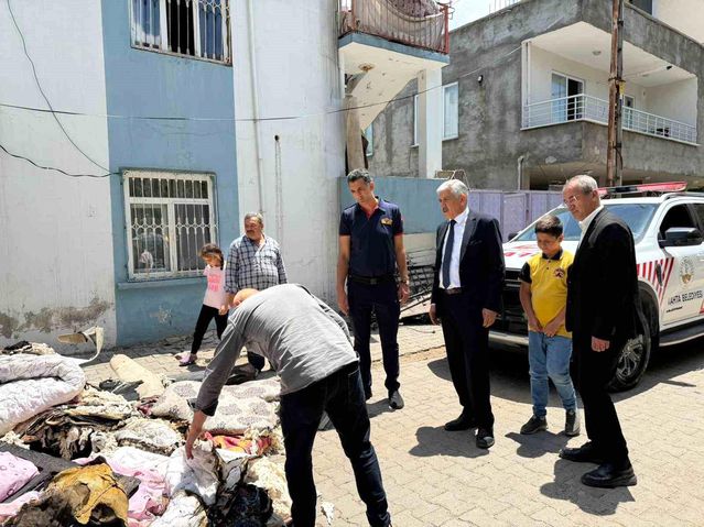 Başkan Hallaç, yangın mağduru aileyi yalnız bırakmadı