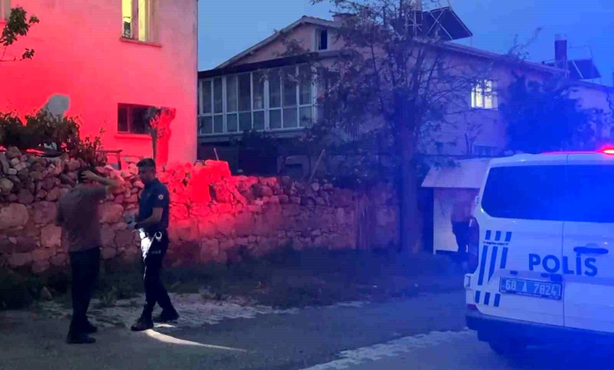 Aksaray'da polis ekiplerinin silahlı şahsı gözaltına aldığı anı gösteren temsili bir görsel.