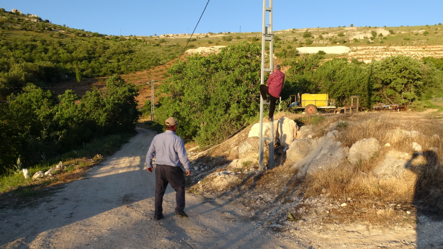 Residents of Maskarlar Hamlet in Malatya climb electrical poles to make phone calls