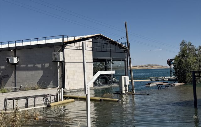 Another flooded business near dam