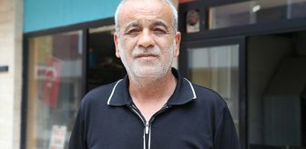 Hatay'da sahipsiz köpeklerin kediye saldırdığı anlar güvenlik kamerasında