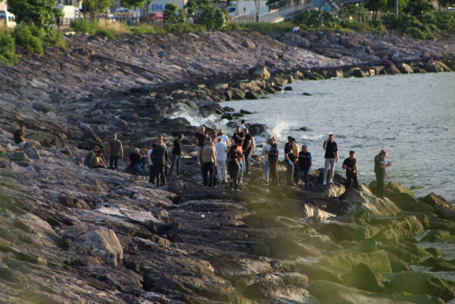 Crime scene investigation teams working on the shore in Giresun