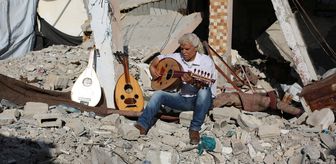 Gazzeli sanatçı Ebu Şaviş, müzik aletlerini onararak savaşla kırılan umutları yeşertiyor