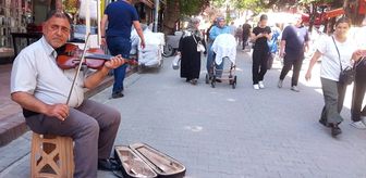 Ayakkabı boyacısı kemanıyla sokaklarda kulakların pasını siliyor