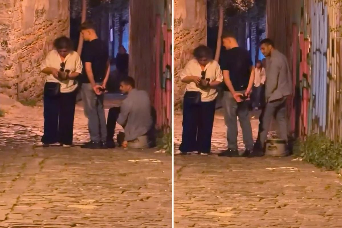 İstanbul'da bir grup turistin ayakkabı boyacısıyla tartıştığı anı gösteren cep telefonu görüntüsü.