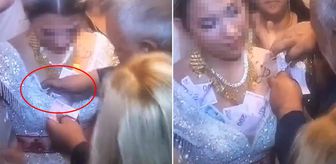 Düğünde olay görüntü! Kayınbabasının para takma şekli gelini rahatsız etti