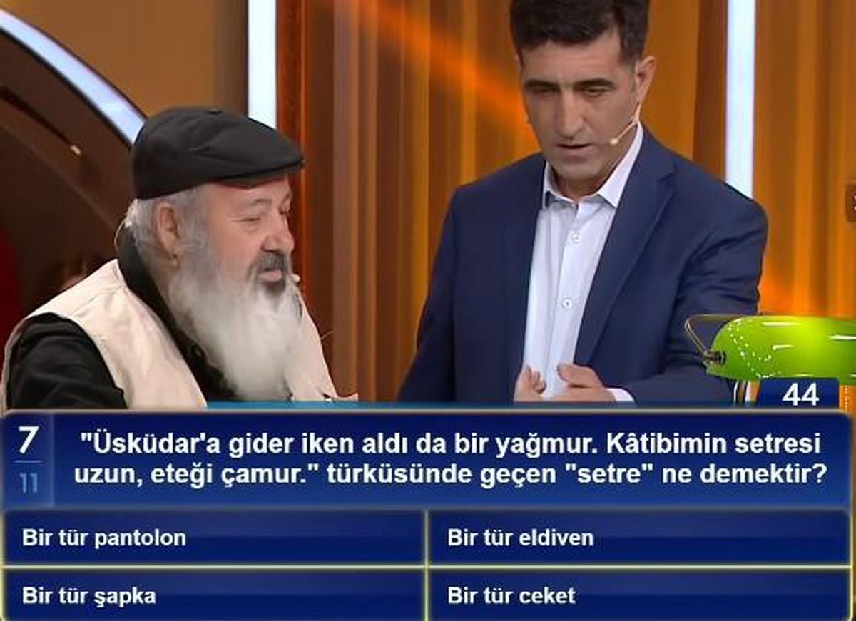 'Üsküdar'a gider iken aldı da bir yağmur. Kâtibimin setresi 11 uzun, eteği çamur.' türküsünde geçen 'setre' ne demektir?