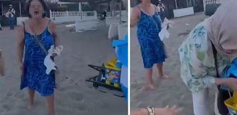 Seferihisar'da türbanlı anne ve kıza plajı dar eden kadın tutuklandı