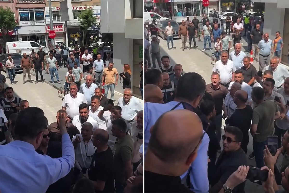 CHP Niğde İl Başkanlığı binası önünde toplanan partililer ve polis.