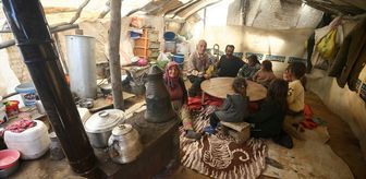 Yazın ortasında soba yakarak ısınıyorlar