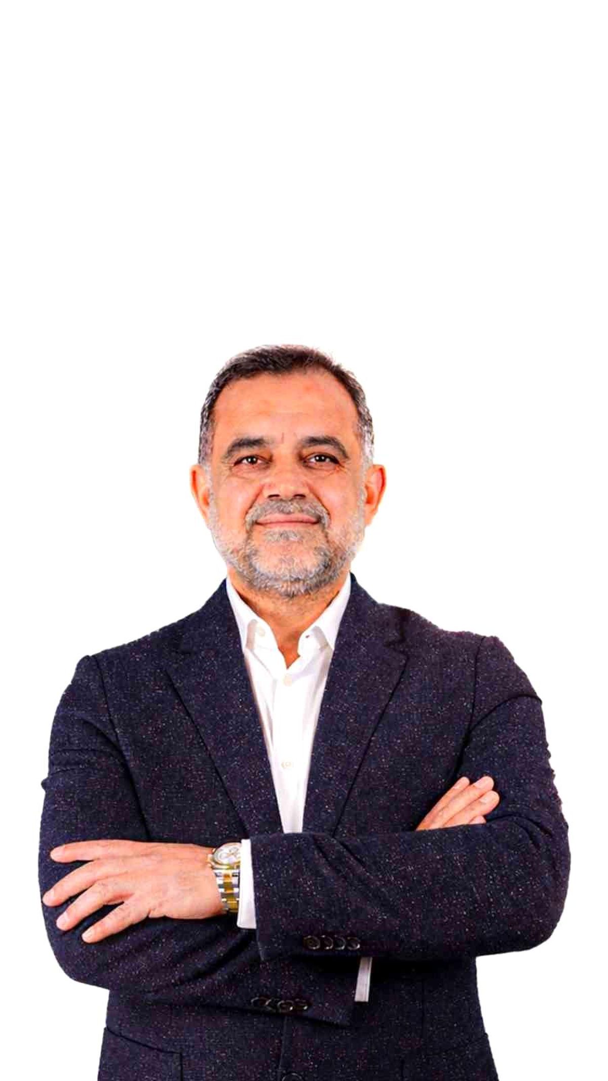 Mardin Ticaret ve Sanayi Odası binası ve Veysi Duyan'ın görseli