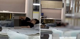 Mağazadaki teşhir yatağında ulu orta ilişkiye girdiler!